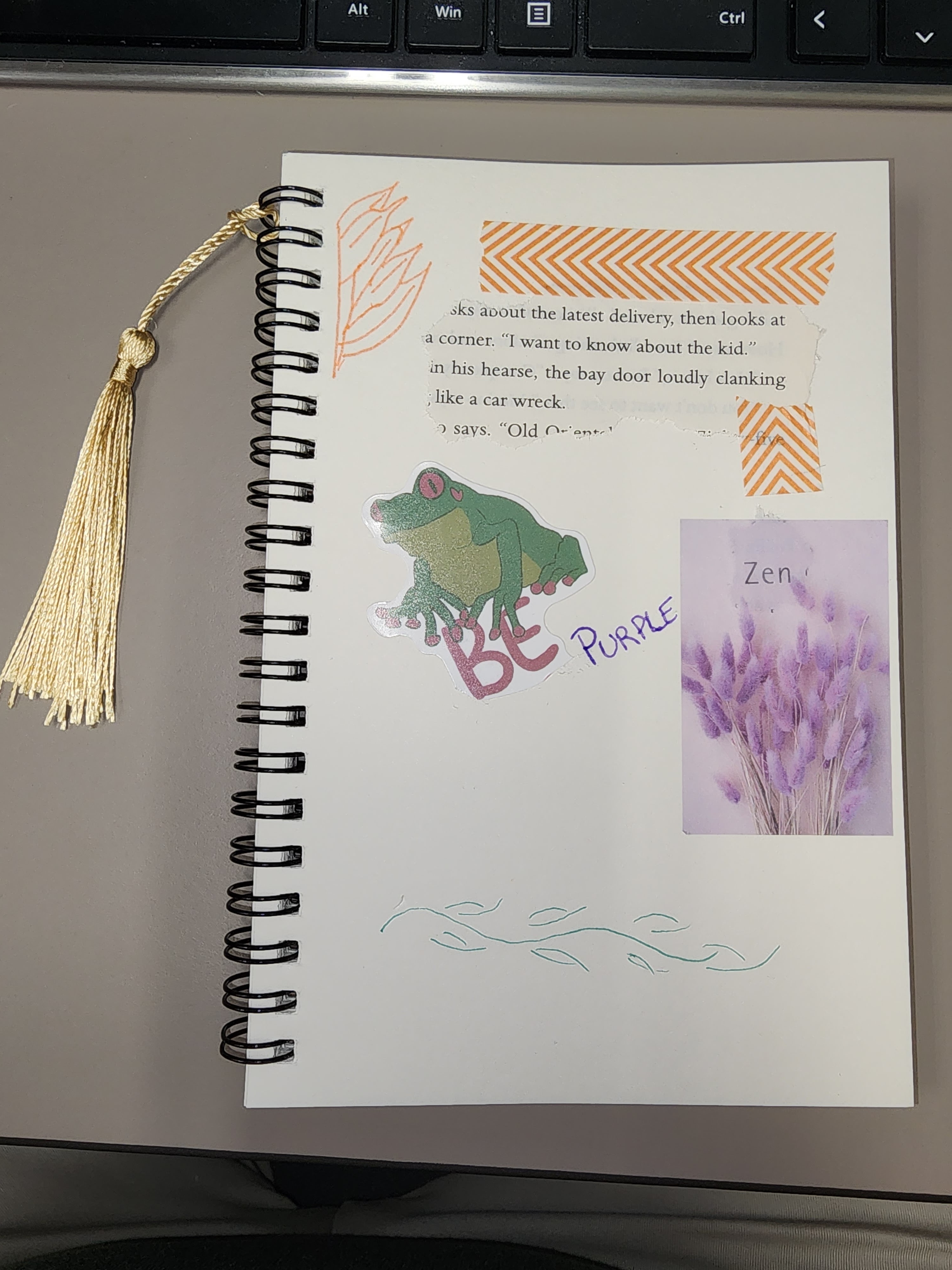an example of a junk journal, various images and book quotes are taped to the inside in an almost random pattern.