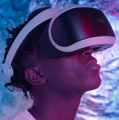 teenage person wearing VR headset