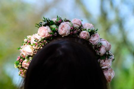 Flower crown on head with brown hair
