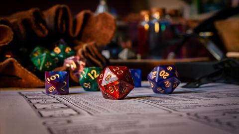 Multi-colored dice on a game board