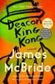 Deacon King Kong by James McBride book cover with a line drawing of a man wearing a suit and hat with blended orange, green and yellow over the entire image.